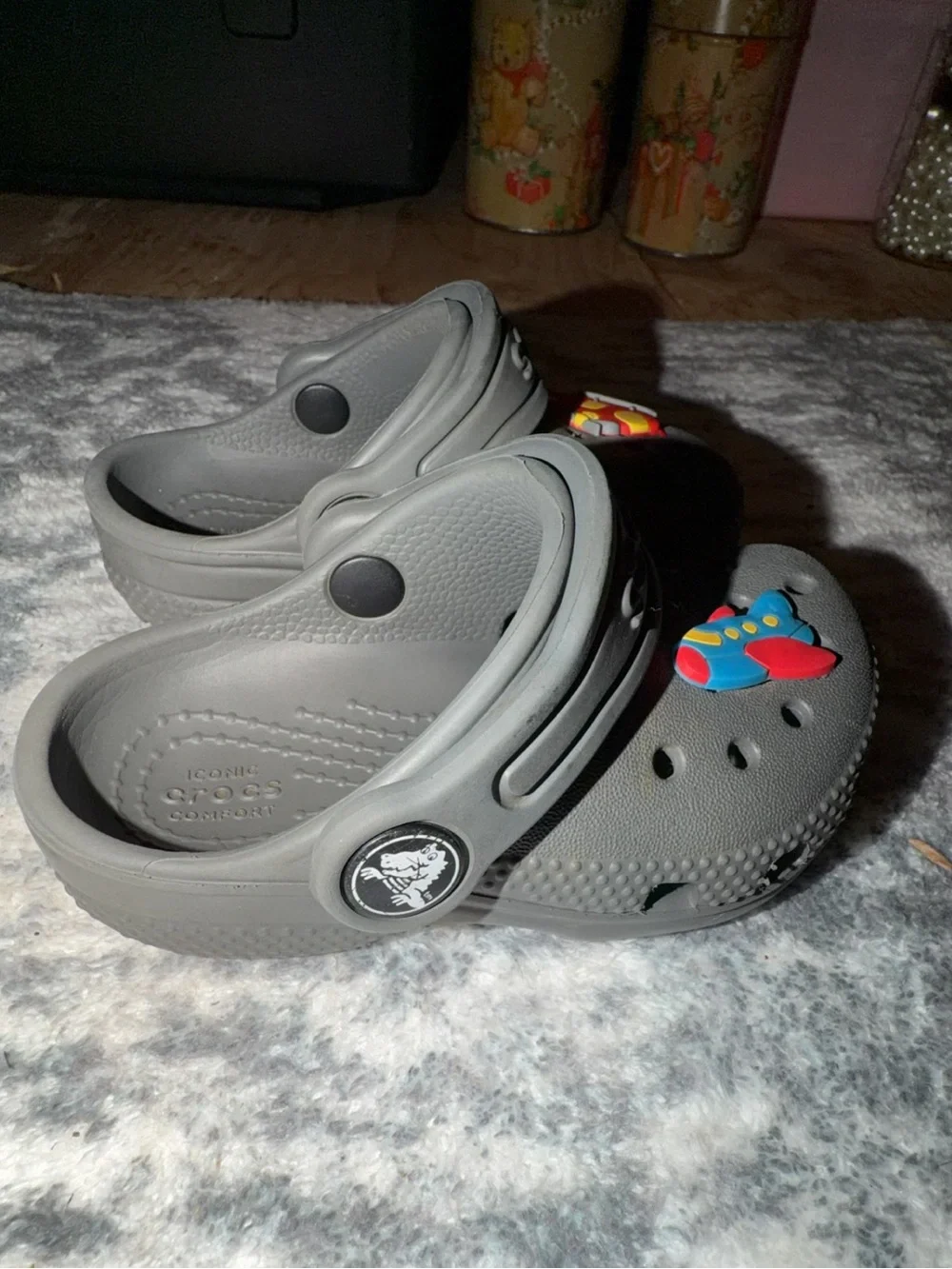 CROCS Kids Gray Classic Clogs with Colorful Plane Charms